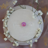 1.35 CT Round Pink Opalescent Sapphire with Red Inclusions